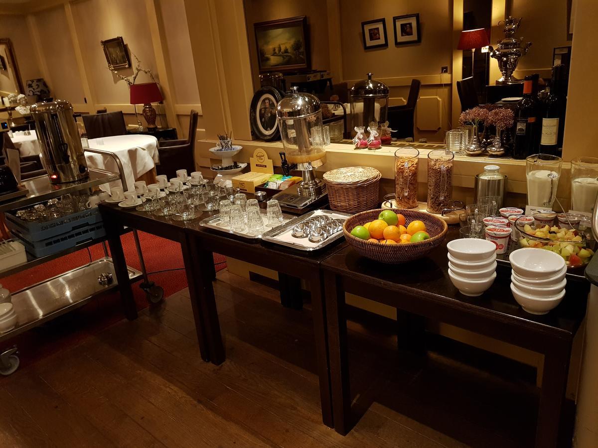 Hotel Restaurant Stad Munster Winterswijk Exterior foto A buffet at a hotel