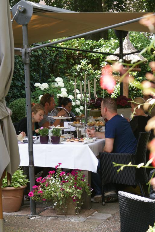 Hotel Restaurant Stad Munster Winterswijk Exterior foto Afternoon tea at the English country house